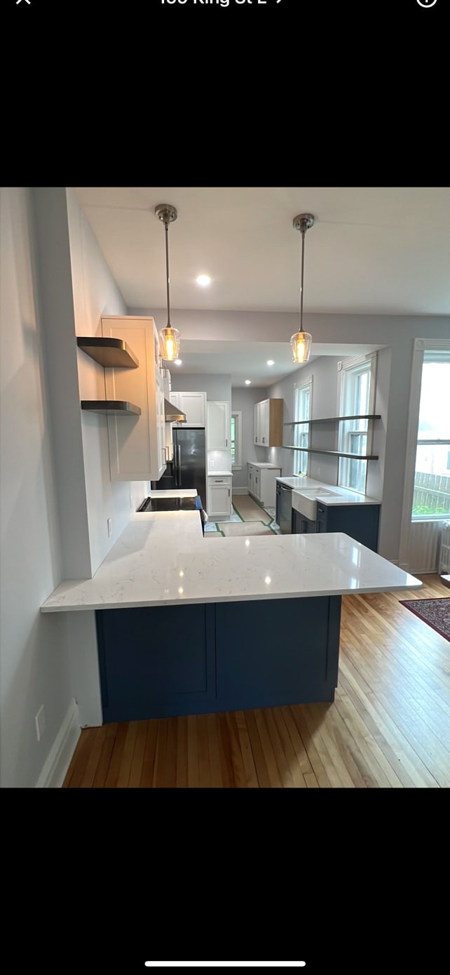 Polished quartz kitchen surface, direct-from-fabricator